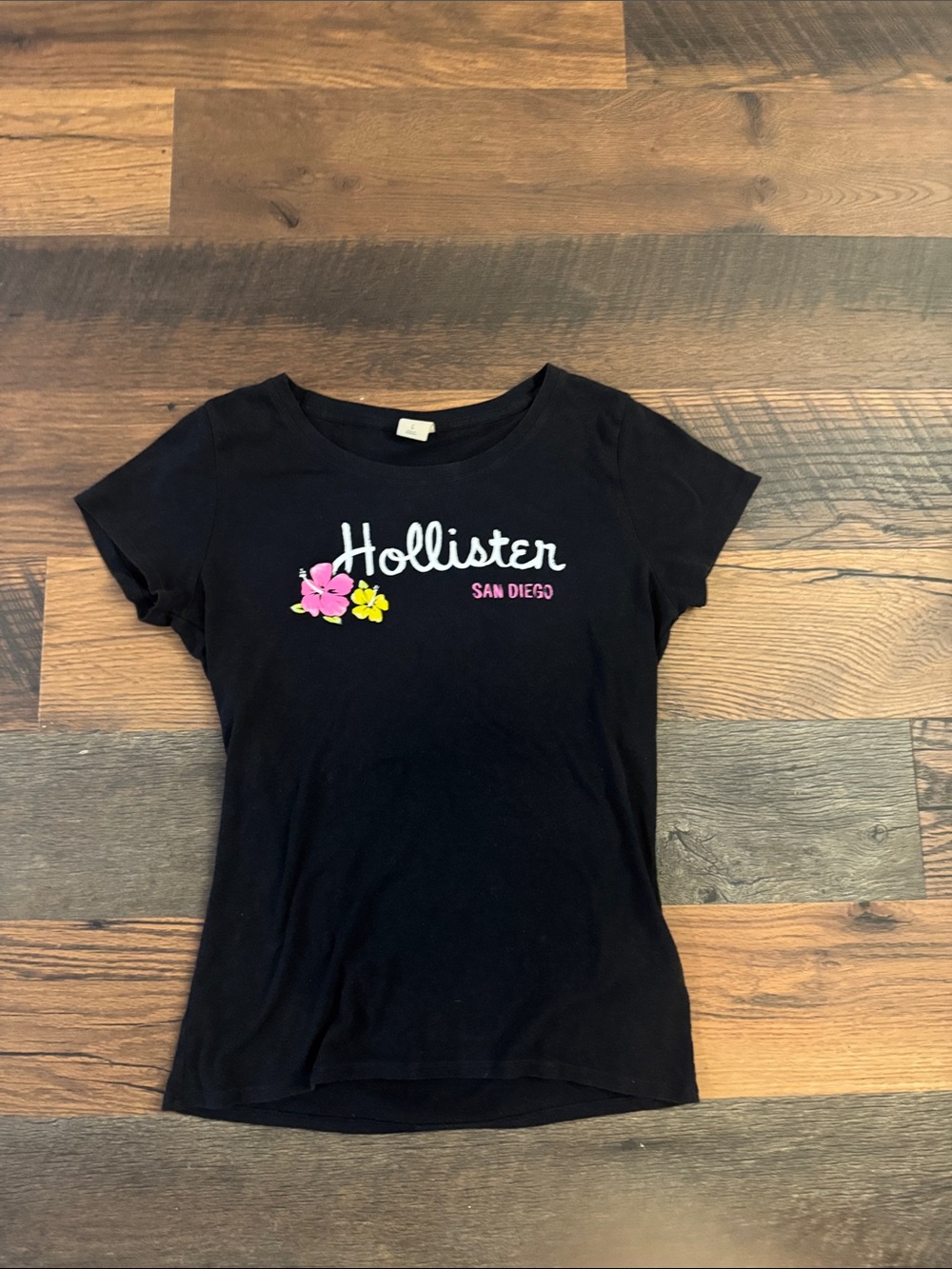 Hollister Black Tee with Pink & Yellow Floral Logo